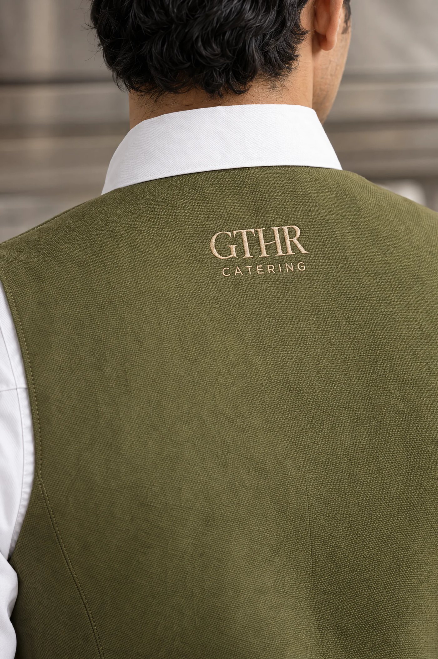 GTHR Catering logo embroidered on the back of the waistcoat